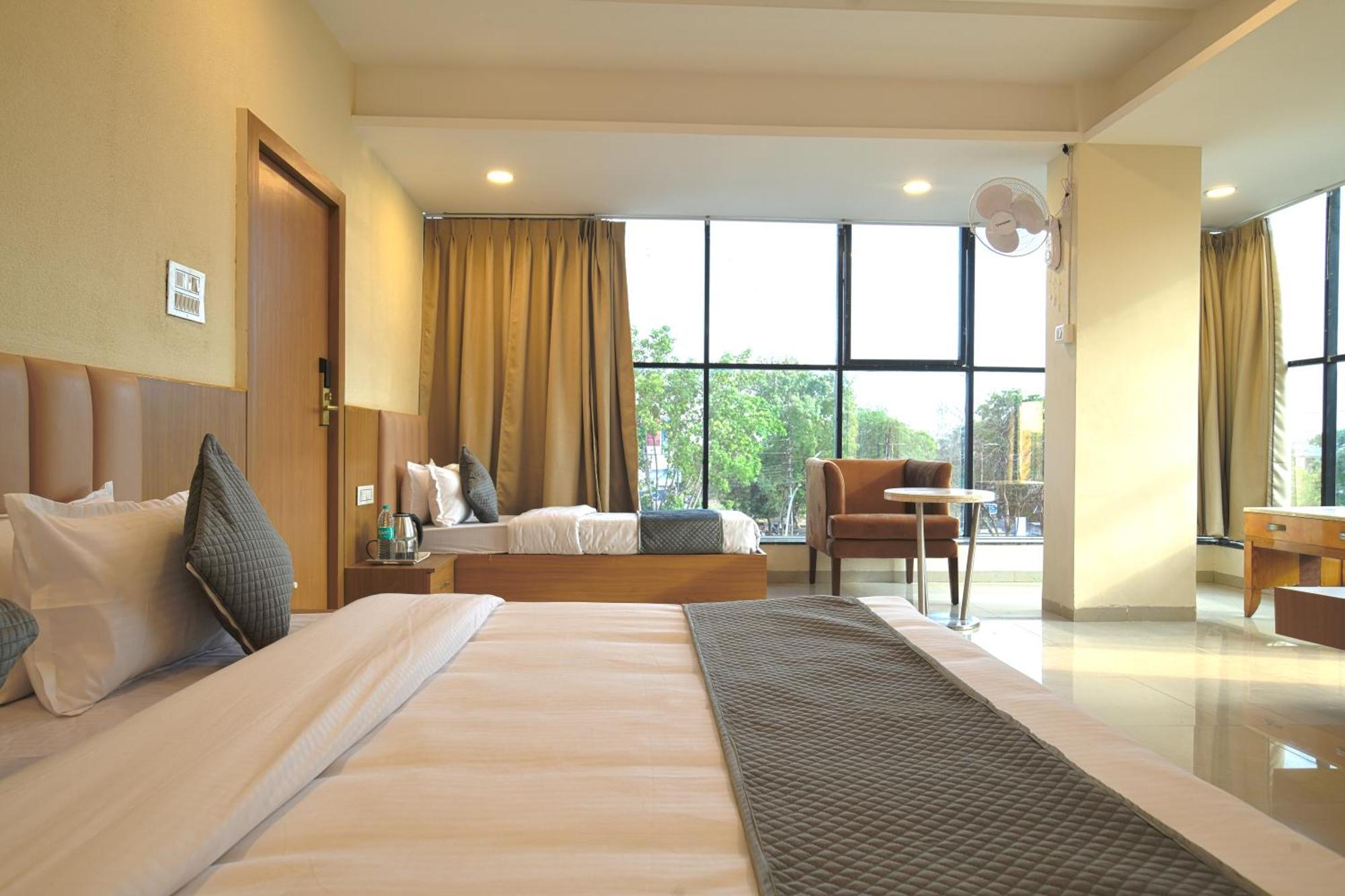 Hotel Shivlok Udždžain Pokoj fotografie