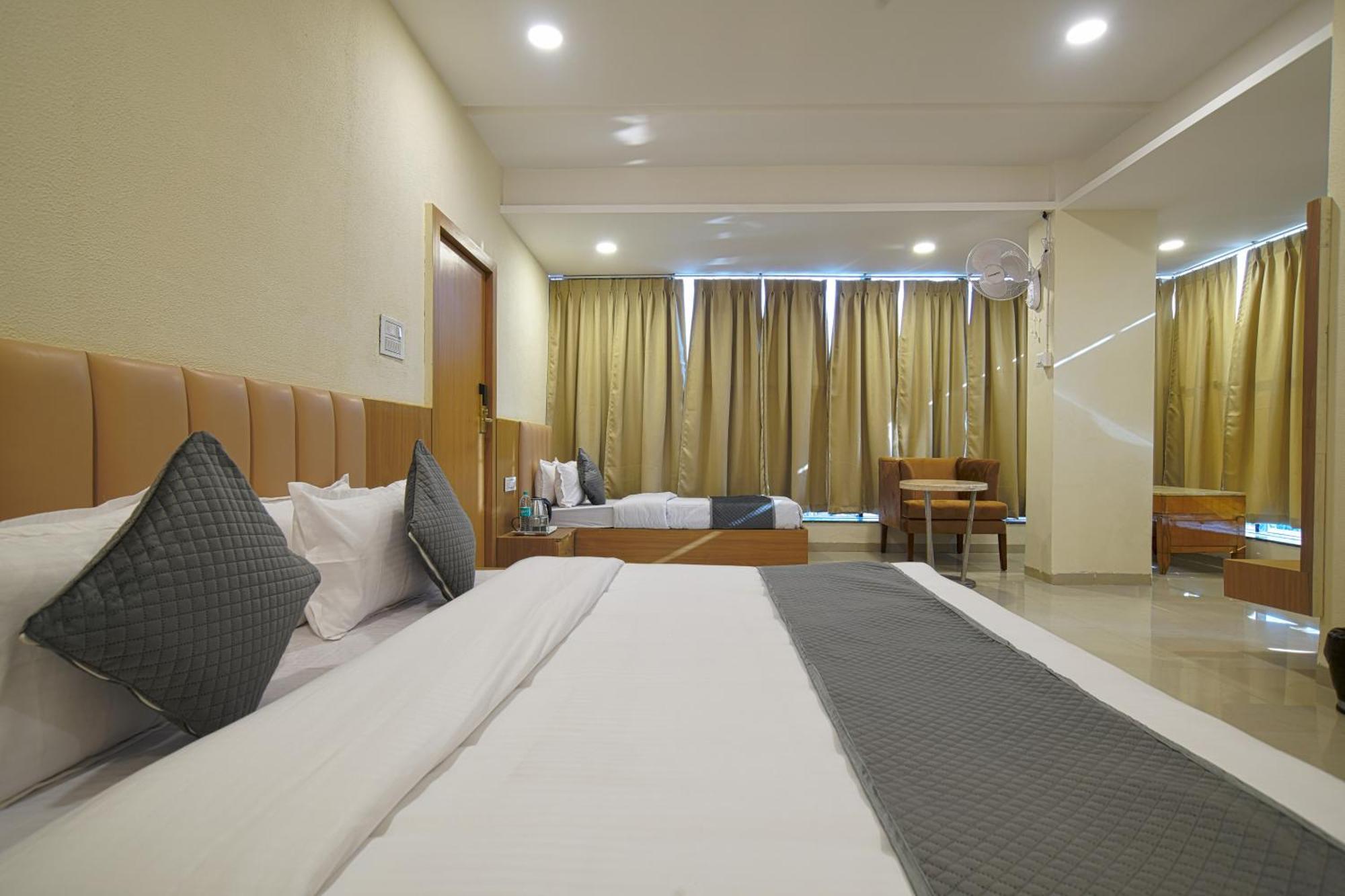 Hotel Shivlok Udždžain Pokoj fotografie